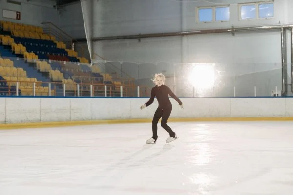 female figure skater performing